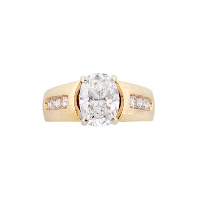 Lot 263 - Two-Color Gold and Laser-Drilled Diamond Ring