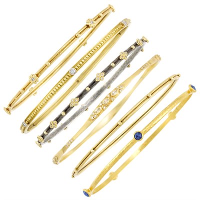 Lot 290 - Six Gold, Silver, Diamond and Black Diamond Bangle Bracelets