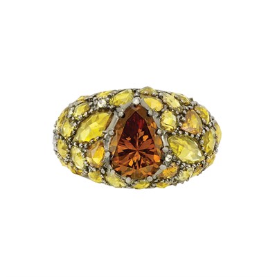 Lot 206 - Blackened White Gold, Fancy Deep Brown-Orange Diamond and Fancy Colored Diamond Ring