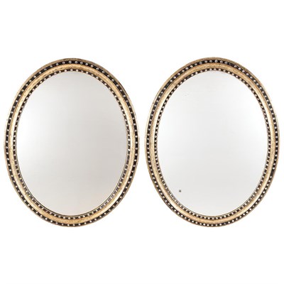 Lot 437 - Pair of Irish Silver Gilt and Ebonized Mirrors...