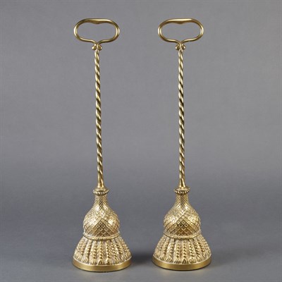 Lot 471 - Two Brass Door Stops Each with a handle above...