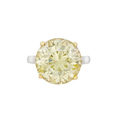 Lot 437 - Platinum, Gold and Fancy Yellow Diamond Ring