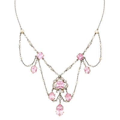 Lot 115 - Belle Epoque Platinum, Gold, Pink Topaz, Diamond and Seed Pearl Swag Necklace
