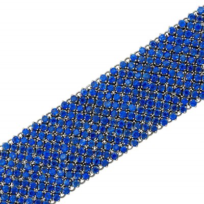 Lot 265 - Wide Blackened White Gold and Sapphire Bracelet
