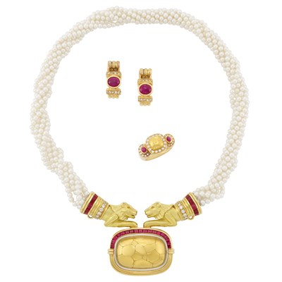 Lot 361 - Multistrand Cultured Pearl, Gold, Ruby and Diamond Lion Head Torsade Necklace, Ring and Pair of Earclips, Chaumet, Paris