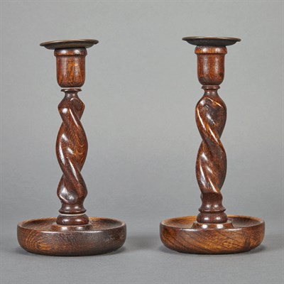 Lot 596 - Pair of Turned Oak Candlesticks Height 8 inches.