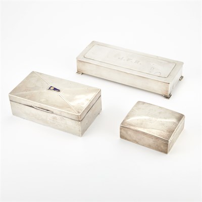 Lot 528 - Three Sterling Silver Table Cigarette Boxes...