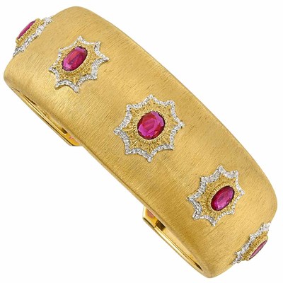 Lot 429 - Two-Color Gold and Ruby Bangle Bracelet, Mario Buccellati