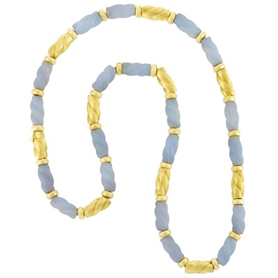 Lot 413 - Long Gold and Fluted Frosted Dyed Blue Chalcedony Bead Necklace, Henry Dunay