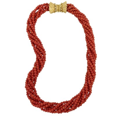 Lot 28 - Seven Strand Oxblood Coral Bead Torsade Necklace with Gold Clasp