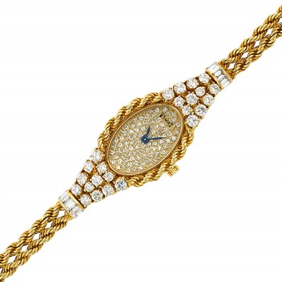 Lot 392 - Lady's Double Strand Gold and Diamond Wristwatch, Piaget