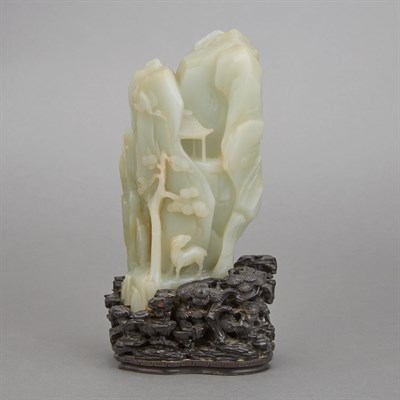 Lot 282 - Chinese Celadon Jade Boulder Carved as a...