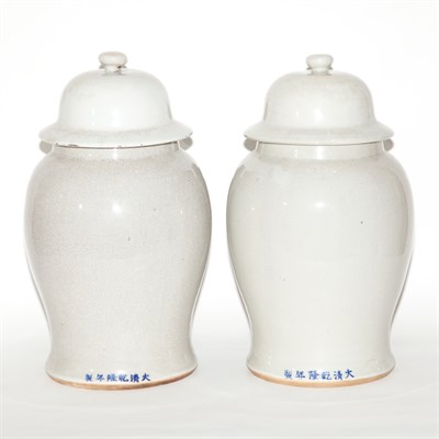 Lot 390 - Pair of Chinese Cream Glazed Porcelain Covered...