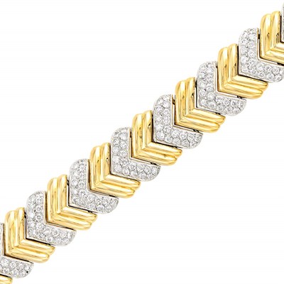 Lot 605 - Two-Color Gold and Diamond Bracelet