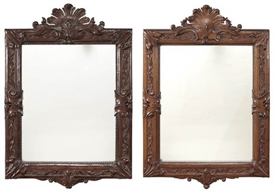 Lot 386 - Pair of Continental Stained Oak Mirrors Each...