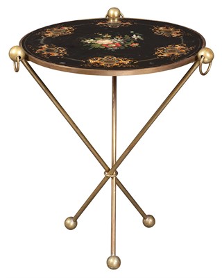 Lot 146 - Brass and Tole Center Table The circular top...