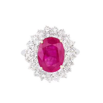 Lot 324 - White Gold, Ruby and Diamond Ring