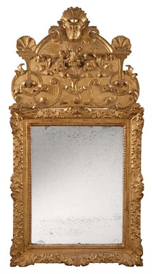 Lot 294 - Regence Giltwood Mirror The shaped cresting...