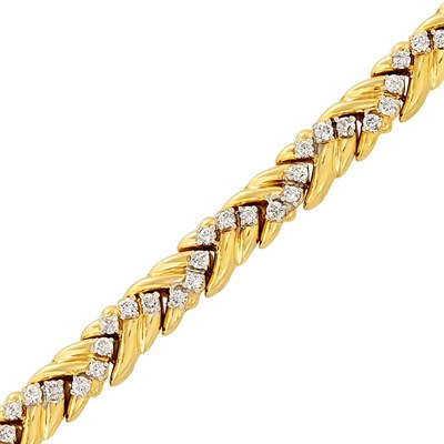 Lot 214 - Two-Color Gold and Diamond Bracelet