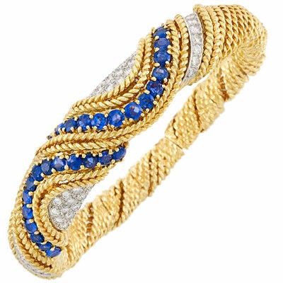 Lot 415 - Two-Color Gold, Sapphire and Diamond Bracelet