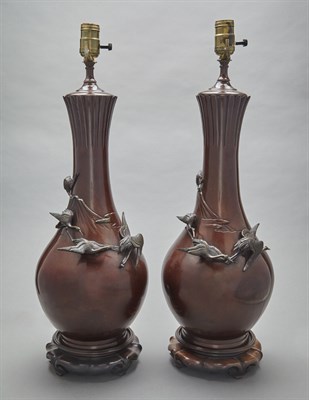 Lot 231 - Pair of Japanese Bronze Patinated-Metal Lamps...