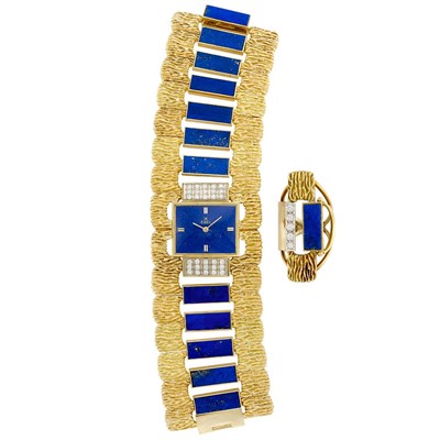 Lot 405 - Two-Color Gold, Lapis Lazuli and Diamond Cuff Wristwatch, Ebel, and Ring