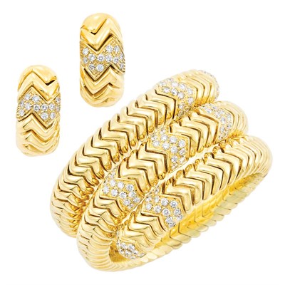 Lot 186 - Coiled Gold and Diamond Bracelet and Pair of Earclips