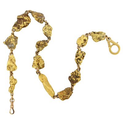 Lot 676 - Nugget Gold Watch Fob Chain