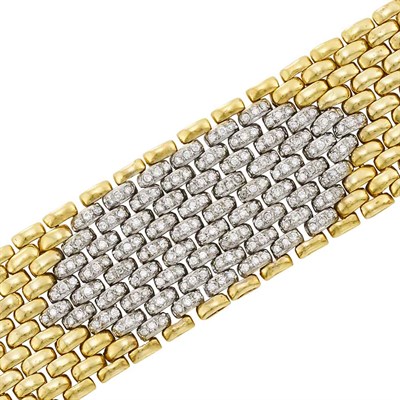 Lot 497 - Wide Two-Color Gold and Diamond Bracelet