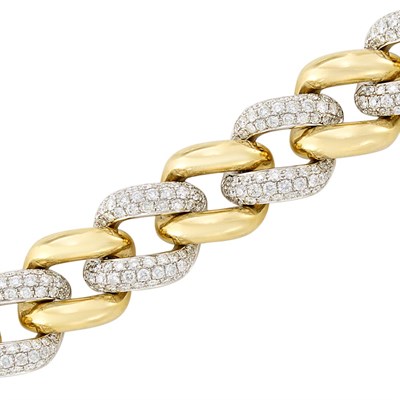 Lot 550 - Two-Color Gold and Diamond Curb Link Bracelet