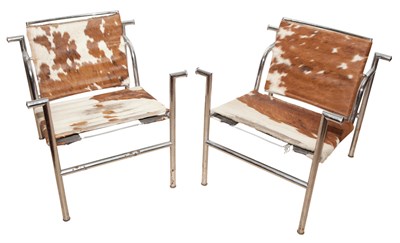 Lot 424 - Pair of Basculant Chromed Metal and Hide Chairs