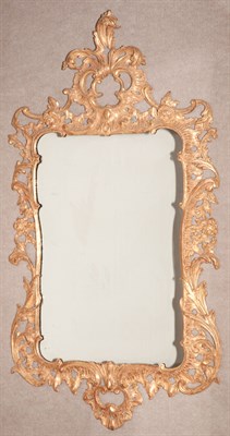 Lot 261 - George II Style Giltwood Mirror The shaped...
