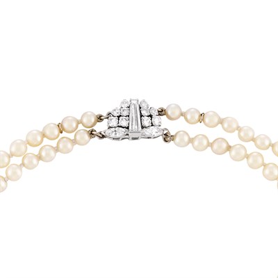 Lot 16 - Double Strand Cultured Pearl Necklace with Diamond Clasp and Pair of Platinum and Cultured Pearl Earclips, France