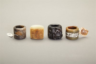 Lot 66 - Group of Four Chinese Jade Archers Rings...