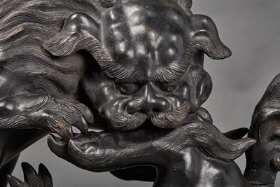 Lot 7 - Pair of Japanese Patinated-Metal Shi Shi...