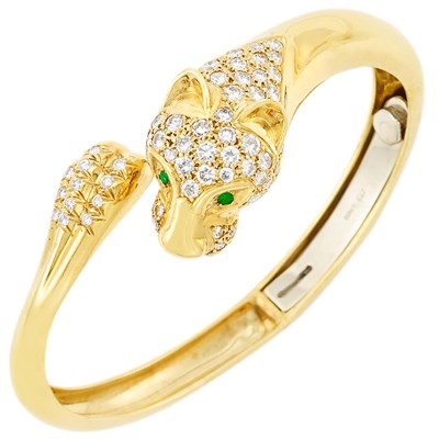 Lot 180 - Gold, Diamond and Emerald Panther Head Bangle Bracelet