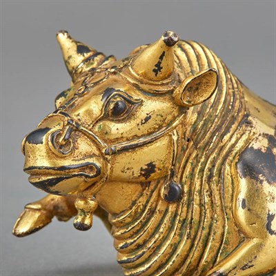 Lot 26 - Chinese Gilt-Bronze Model of an Ox Cast in a...