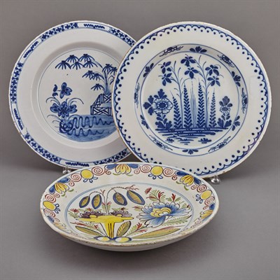 Lot 223 - Two Dutch Delft Blue and White Faience...