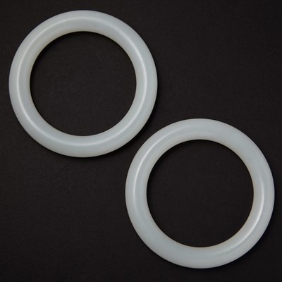 Lot 113 - Pair of Chinese White Jade Bangles Each of...