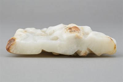 Lot 121 - Chinese White and Russet Jade Brushrest Carved...
