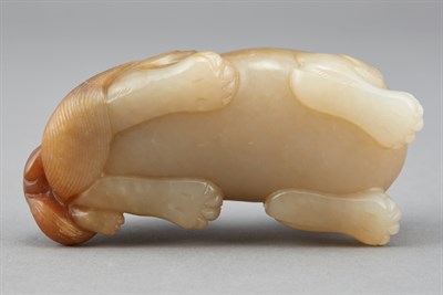Lot 124 - Chinese Celadon and Russet Jade Qilin Group...