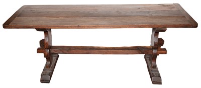 Lot 618 - Continental Oak Table The three-plank cleated...