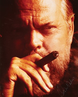 Lot 262 - WELLES, ORSON Self-portrait on a Macanudo...