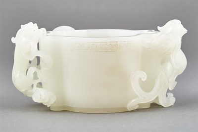 Lot 114 - Chinese White Jade Two-Handled Cup The deep...