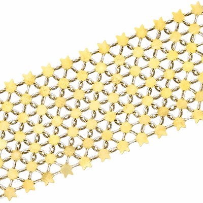 Lot 543 - Seven Strand Two-Color Gold Star Cuff Bracelet