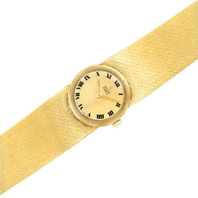 Lot 556 - Lady's Gold Wristwatch, Corum, Retailed by Van Cleef & Arpels