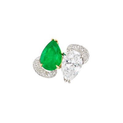 Lot 297 - White Gold, Gold, Diamond and Emerald Crossover Ring