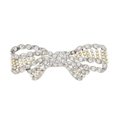 Lot 85 - Belle Epoque Platinum, Seed Pearl and Diamond Bow Brooch, Dreicer & Co.