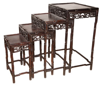 Lot 292 - Nest of Four Chinese Carved Hardwood Tables...