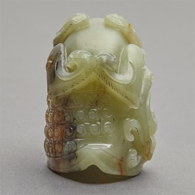 Lot 150 - Chinese Celadon and Russet Jade Rhyton Cup The...